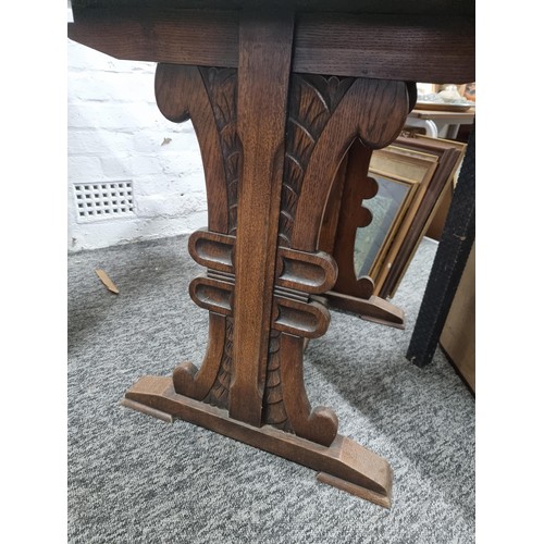 30 - Good quality refectory table in oak with ornate carved legs in the style of a plume of feathers, in ... 