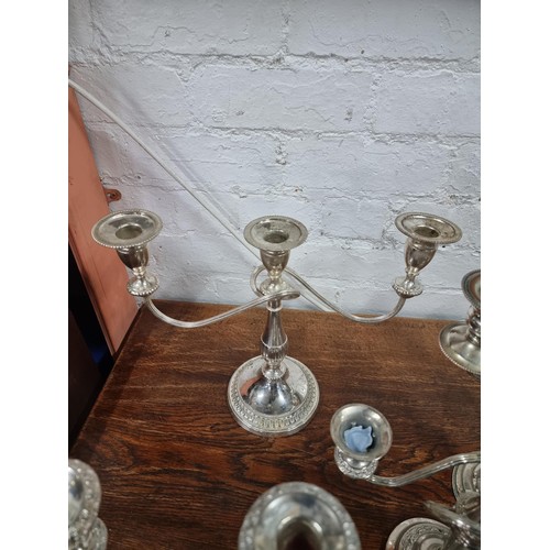 31 - Collection of 6x 3 tier silver plate candelabras with scroll design inc a pair by Lanthe and a singl... 