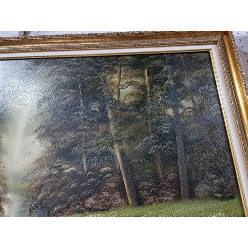 34 - Gilt framed oil on canvas painting of a woodland scene, well executed signed to the lower right by l... 