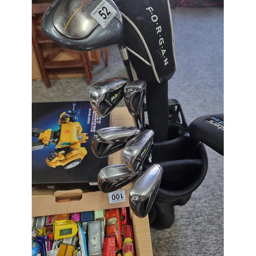 52 - A good quality set of golf cubs in a golf bag inc 6x Taylor Made M2 golf Irons 4 - 9, Taylor Made Bu... 