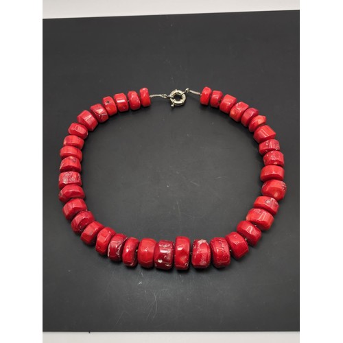 269 - A large and impressive natural red coral beaded necklace having a good weight and presenting an exce... 