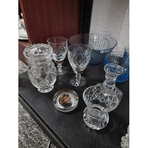 18 - Shelf containing a large quantity of cut glass crystal glassware inc crystal cut vases, blue glass s... 