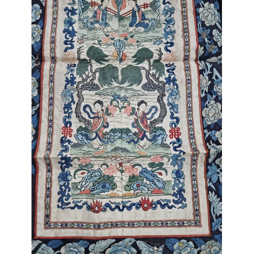 29 - Good quality antique silk wall hanger with oriental scene and blue flower border in good order with ... 