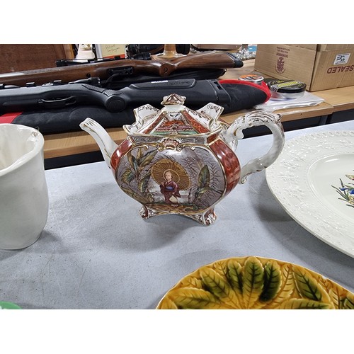 16 - A shelf full of collectable ceramics including a Royal Worcester Evesham tureen, a Crown Devon servi... 