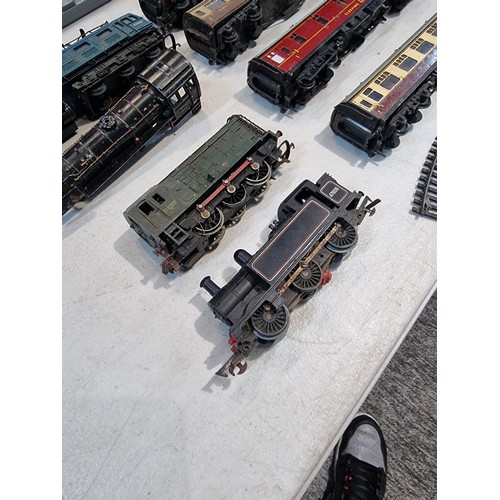 Quantity of and coaches inc a black engine with the running