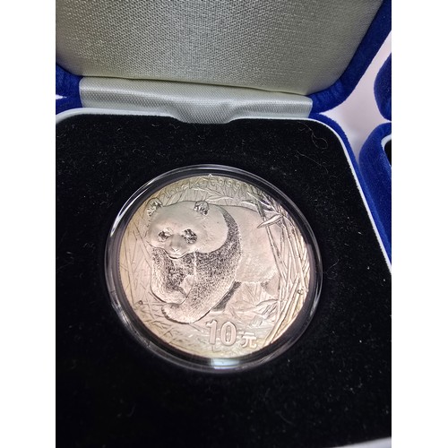 2x cased The Royal Mint Chinese commemorative 10 yuan .999 silver coins