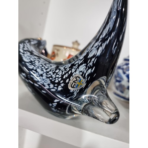 9 - A shelf full of collectables including a good quality handmade art crystal seal by l'ne studio Swede... 