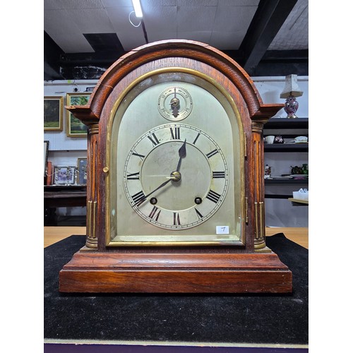 46 - A good quality antique oak mantel clock featuring an 8 day movement striking with a ting tang double... 