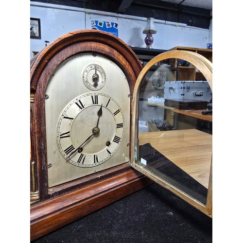 46 - A good quality antique oak mantel clock featuring an 8 day movement striking with a ting tang double... 