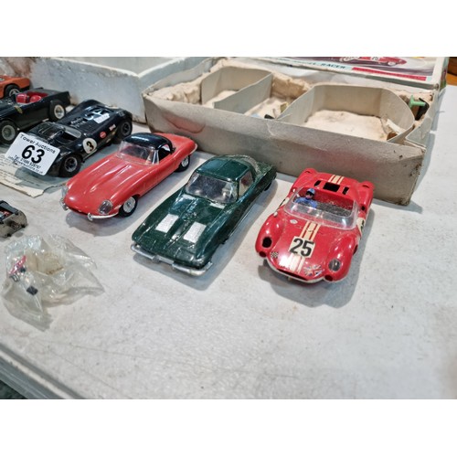 63 - Collection of slot car racing cars along with two boxes for slot cars inc a Revell model racer sting... 