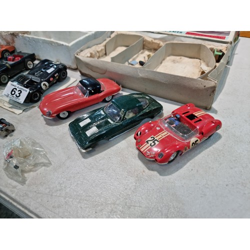 63 - Collection of slot car racing cars along with two boxes for slot cars inc a Revell model racer sting... 