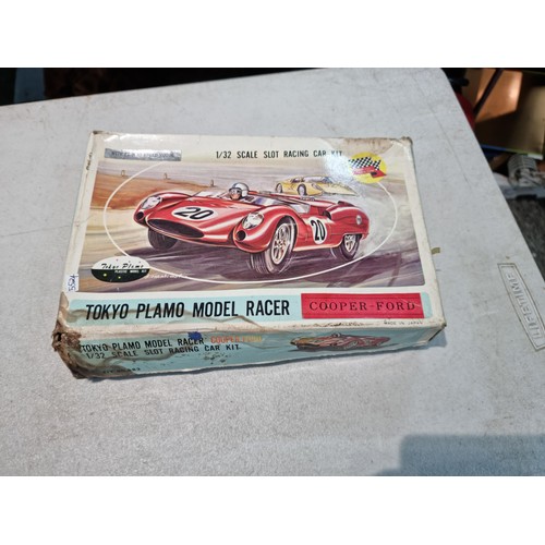 63 - Collection of slot car racing cars along with two boxes for slot cars inc a Revell model racer sting... 