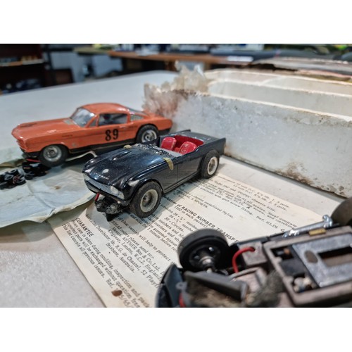 63 - Collection of slot car racing cars along with two boxes for slot cars inc a Revell model racer sting... 
