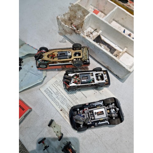 63 - Collection of slot car racing cars along with two boxes for slot cars inc a Revell model racer sting... 