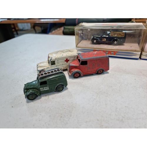 64 - Quantity of Dinky vehicles, inc 3x boxed Dinky cars inc a pink Cadillac, Nash Rambler, Royal Mail Va... 