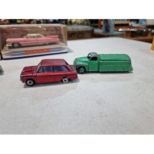 64 - Quantity of Dinky vehicles, inc 3x boxed Dinky cars inc a pink Cadillac, Nash Rambler, Royal Mail Va... 