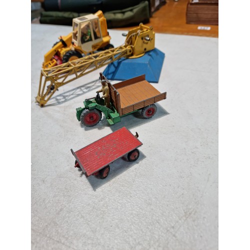 67 - Quantity of vintage Dinky vehicles inc a 2x caravans, a hovercraft, a crane, an escalator etc all in... 