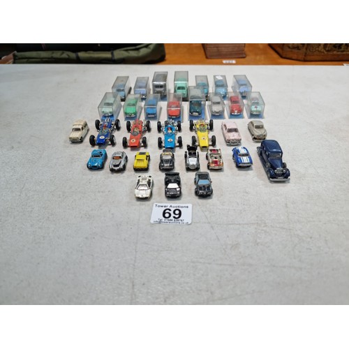 69 - Large quantity of rare collectable vehicles of various brands inc 15x cased Norev vehicles, 12x coll... 