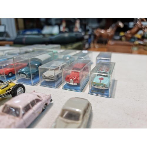 69 - Large quantity of rare collectable vehicles of various brands inc 15x cased Norev vehicles, 12x coll... 