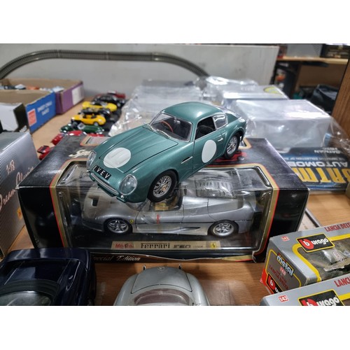 70 - Quantity of collectable scale model cars by Burago and Maisto, inc 2x boxed Lancia Burago cars, boxe... 