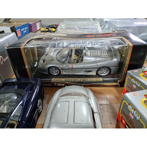 70 - Quantity of collectable scale model cars by Burago and Maisto, inc 2x boxed Lancia Burago cars, boxe... 