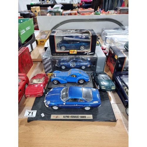 71 - Quantity of collectable diecast vehicles inc a boxed Maisto Jaguar XK180 1/25 scale, a boxed Maisto ... 