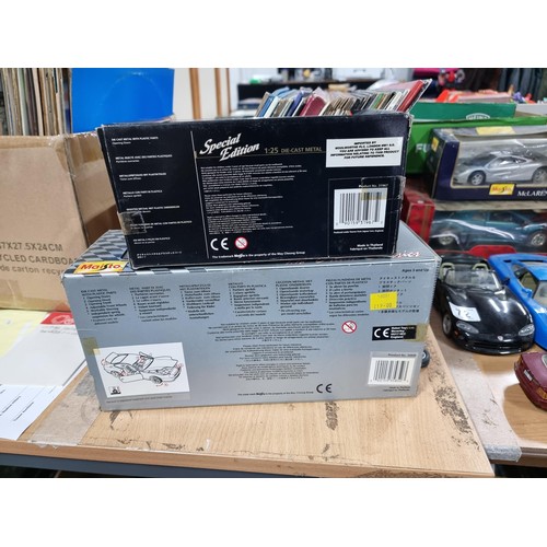 71 - Quantity of collectable diecast vehicles inc a boxed Maisto Jaguar XK180 1/25 scale, a boxed Maisto ... 
