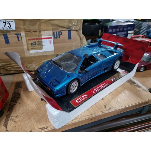 72 - Collection of diecast vehicles inc a boxed Mira Lamborghini Diablo 1/18 scale, a boxed Maisto Mclare... 
