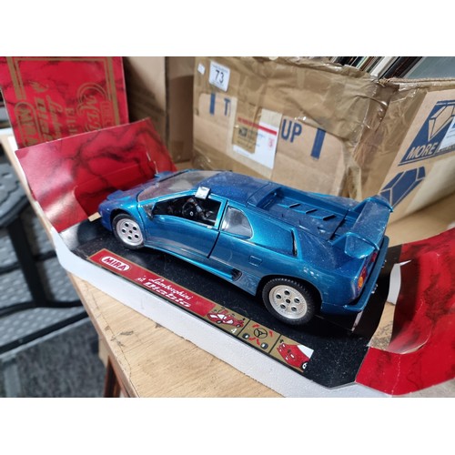 72 - Collection of diecast vehicles inc a boxed Mira Lamborghini Diablo 1/18 scale, a boxed Maisto Mclare... 
