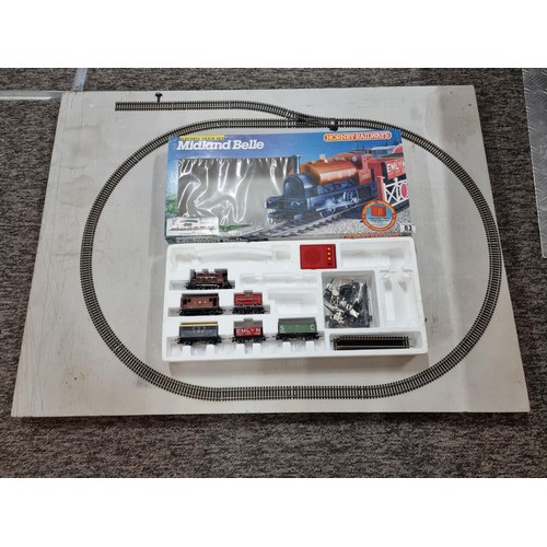 83 - Large 3ft x 4ft board layout with a single loop 00 gauge Hornby track along with a boxed Midland Bel... 