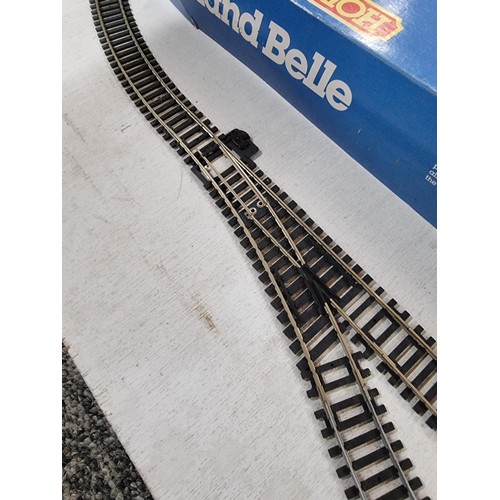 83 - Large 3ft x 4ft board layout with a single loop 00 gauge Hornby track along with a boxed Midland Bel... 