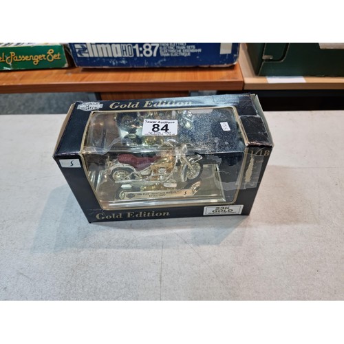 84 - Good quality boxed Maisto 1/18 scale 23ct gold plated Harley Davidson motorbike in a presentation bo... 