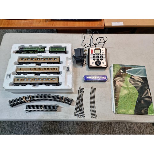 87 - Box containing a Flying Scotsman LNER 4772 locomotive and tender, spares and repair loose wire, 3 LN... 
