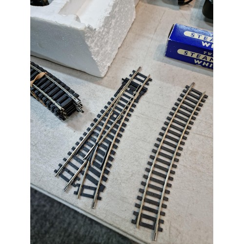 87 - Box containing a Flying Scotsman LNER 4772 locomotive and tender, spares and repair loose wire, 3 LN... 
