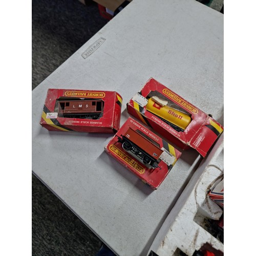 93 - Quantity of Hornby boxed train items inc a partially complete Hornby Junior electric train set, boxe... 