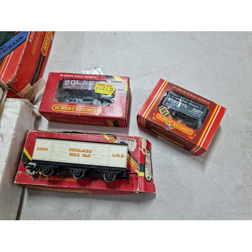 93 - Quantity of Hornby boxed train items inc a partially complete Hornby Junior electric train set, boxe... 