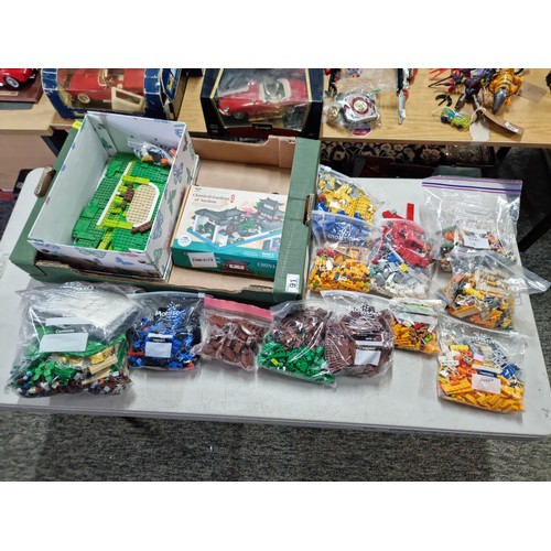 91 - Box containing a very large quantity of assorted Lego in various bags inc classical gardens of Suzho... 