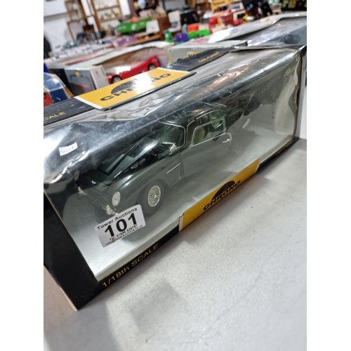 101 - Collection of 3x diecast boxed cars inc Sun Star metal Aston Martin DB5 1/18 scale, a Maisto Mercede... 