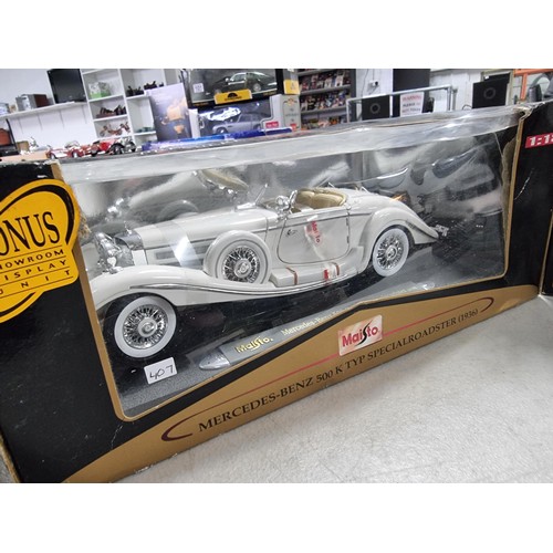 104 - 3 boxed Maisto boxed diecast vehicles including special edition Porsche boxter, a Mercedes Benz 280S... 