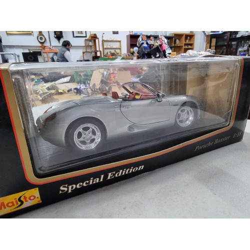 104 - 3 boxed Maisto boxed diecast vehicles including special edition Porsche boxter, a Mercedes Benz 280S... 