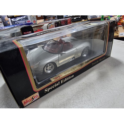104 - 3 boxed Maisto boxed diecast vehicles including special edition Porsche boxter, a Mercedes Benz 280S... 