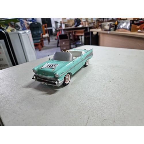 105 - A collection of 4x rare chain driven heavy diecast cars by Gearbox Collectibles, including a boxed 1... 