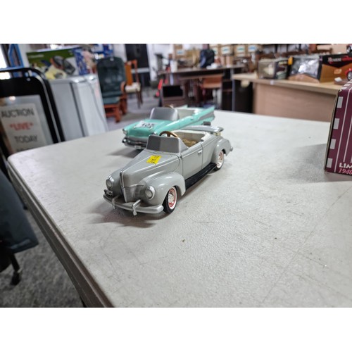 105 - A collection of 4x rare chain driven heavy diecast cars by Gearbox Collectibles, including a boxed 1... 