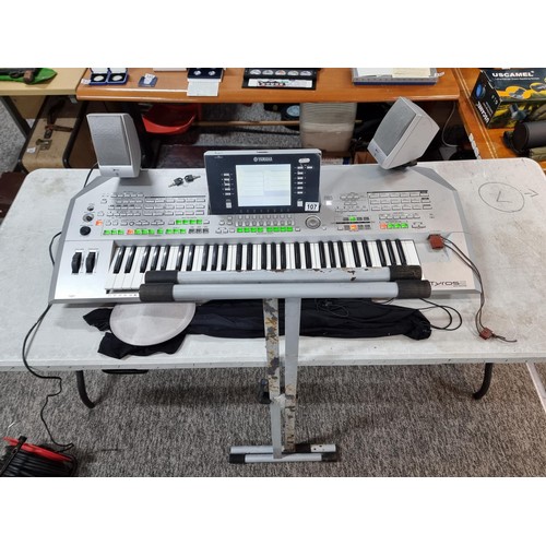 107 - A Yamaha Tyros II, 61 key workstation synthesizer/keyboard, includes its clip on speakers and workin... 