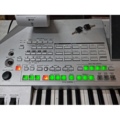 107 - A Yamaha Tyros II, 61 key workstation synthesizer/keyboard, includes its clip on speakers and workin... 