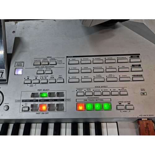 107 - A Yamaha Tyros II, 61 key workstation synthesizer/keyboard, includes its clip on speakers and workin... 