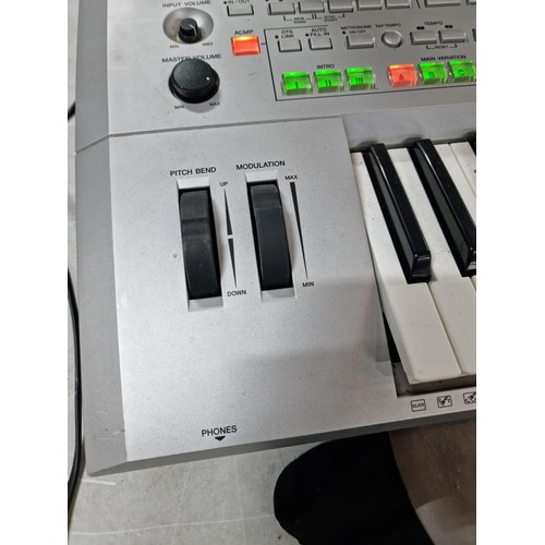 107 - A Yamaha Tyros II, 61 key workstation synthesizer/keyboard, includes its clip on speakers and workin... 