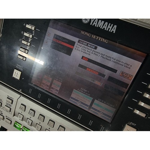 107 - A Yamaha Tyros II, 61 key workstation synthesizer/keyboard, includes its clip on speakers and workin... 