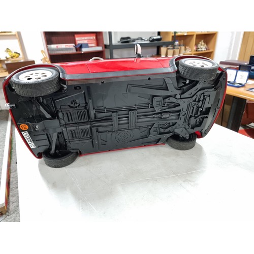108 - very Large scale radio controlled mini cooper complete with handset complete with cable, measures 28... 