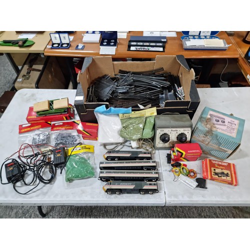 112 - Box containing a large quantity of model train 00 gauge  accesories inc a large quantity of track, s... 